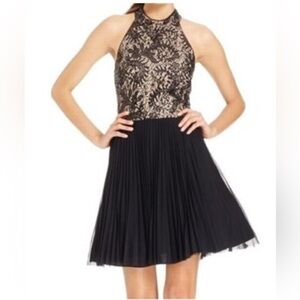 Xscape Elegant Black and Gold Gown